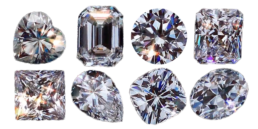 8 loose diamonds shown in different diamond shapes including heart, emerald cut, round brilliant, radiant, princess, pear, square cushion and oval.
